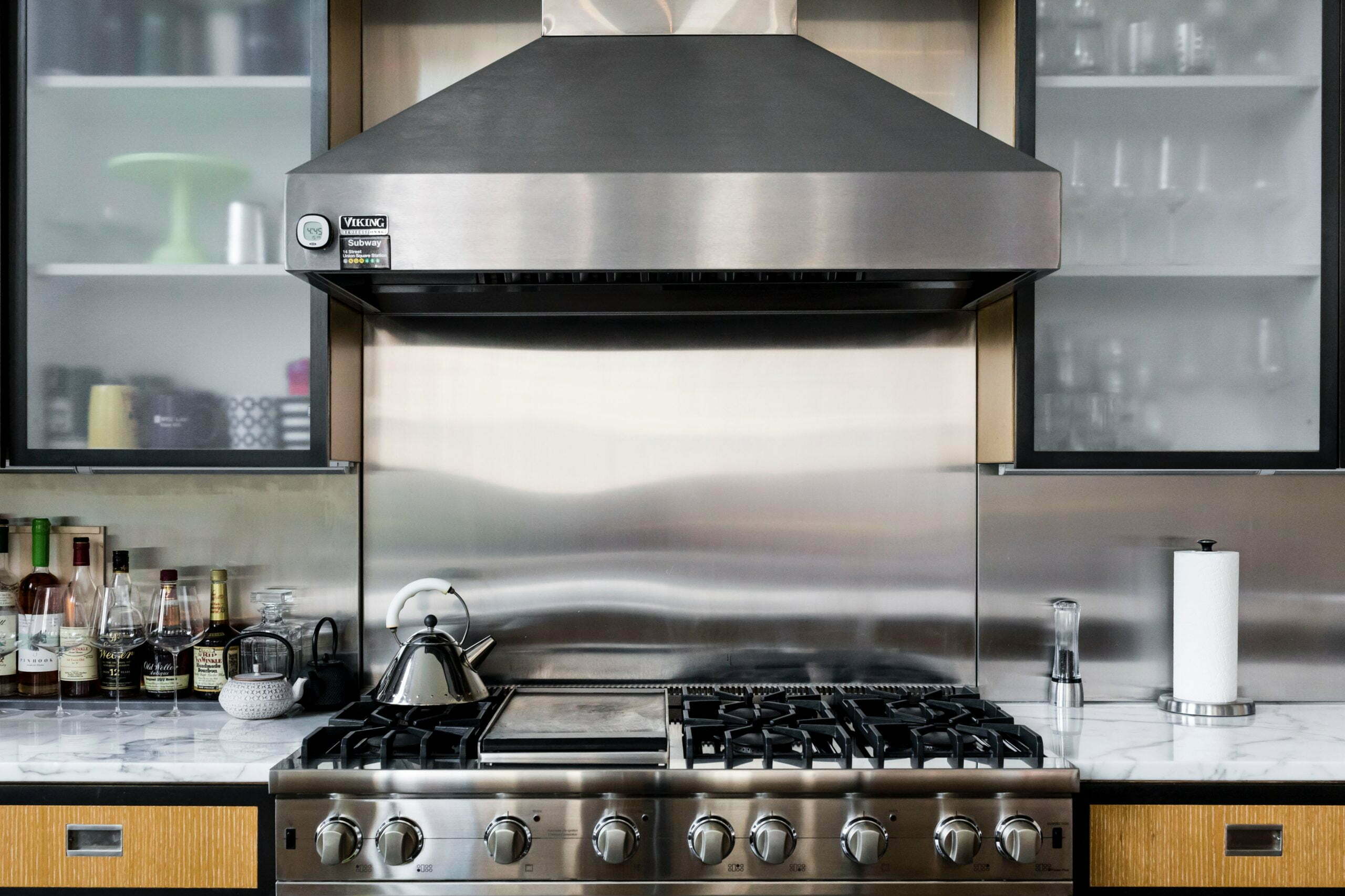 a stove top with a kettle on top