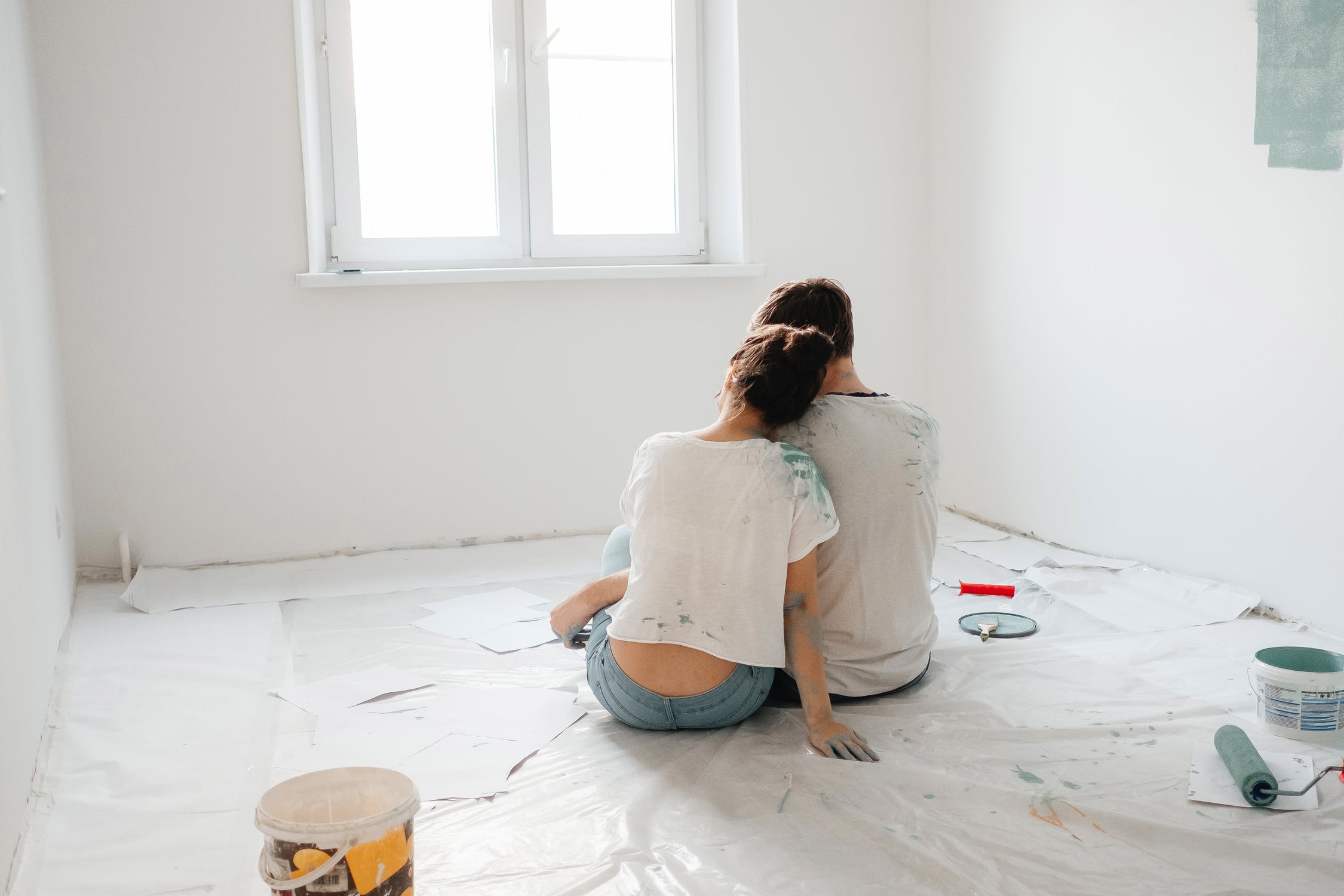 a woman sitting on the floor