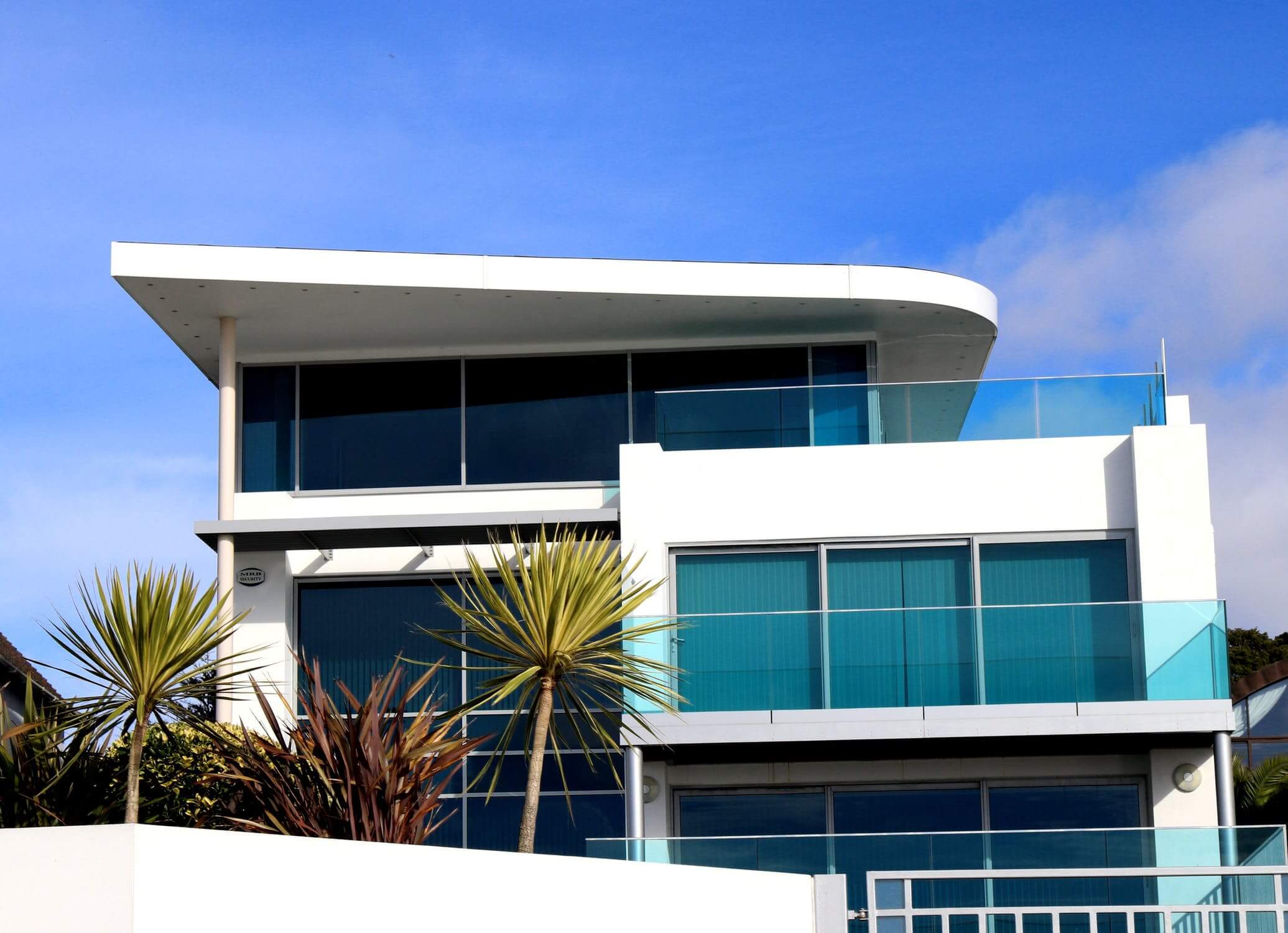 a building with palm trees